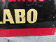 Delcampe - Ancienne Plaque Tôle Publicitaire Garantie Labo Huile Auto - Blechschilder (ab 1960)