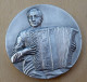 D3-831 Médaille Bronze Argenté (poinçon) Signée Schudin De 40mm De Diamètre,poids=34,30g - Strumenti Musicali