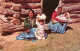 72780030 Arizona_US-State Navajo Women In Front Of Their Log And Mud Hogan - Autres & Non Classés