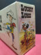 Delcampe - Colección Completa Con Caja Expositora Antiguas Películas Cintas De Vídeo Cassette VHS Lucky Luke - Collections & Sets