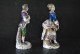 PAIRE De STATUETTES COUPLE DE BOURGEOIS EN HABITS XVIIIe EN PORCELAINE POLYCHROME DE CAPODIMONTE 2 Marques Différentes - Capodimonte (ITA)