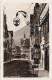 Ansichtskarte Bad Urach Wilhelmstraße - Geschäfte 1932  - Bad Urach