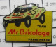 718B  Pin's Pins / Beau Et Rare / SPORTS / AUTOMOBILE RALLYE PARIS PEKIN TEAM Mr BRICOLAGE BUGGY - Automovilismo - F1