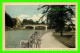 OTTAWA, ONTARIO - GARDEN SCENE ALONG DOMINION DRIVEWAY SHOWING RIDEAU CANAL AND BANK STREET BRIDGE - - Ottawa