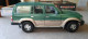 Delcampe - Road Tough 1992 Toyota Land Cruiser Green  1:18 - Yat Ming