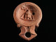 A Roman Terracotta Oil Lamp With A Cista/altar - Archeologie