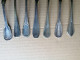 UN LOT DE 7 PETITES CUILLERES EN METAL ARGENTE - Silverware