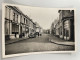 CPSM - 62 - HARNES - Rue Des Fusillés - Animée Voiture à Déterminer - Chaussures GALLAND - Harnes