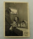 Two Little Girls Are Playing With A Doll - Personnes Anonymes