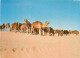 Animaux - Camélidés - Tunisie - Le Sahara - Troupeau De Chameaux - Camels - CPM - Voir Scans Recto-Verso - Autres & Non Classés