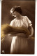 CO49. Antique Postcard. Young Woman Carrying Wheat. - Femmes