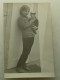 A Young Girl With A Cat In Her Hands - Personnes Anonymes