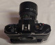 Delcampe - Canon A-1 Black With 50/1.4 And Extras - Appareils Photo