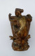 Delcampe - Sculpture Bronze Faune S'agrippant à Un Vase Posé Sur Tortue Et Serpent - Bronces