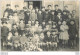 CARTE PHOTO GROUPE D'ENFANTS AVEC CASQUETTES LIEU NON IDENTIFIE - To Identify