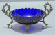 Delcampe - -JOLIE COUPELLE VIDE POCHE VERRE Bleu MONTURE Bronze Avec 2 PIEDS BLASONS   E - Verre & Cristal
