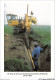 AJJP7-0634 - METIER - POSE DE DRAINS PAR L'ENTREPRISE OUEST-DRAINS DE BAIS  - Farmers