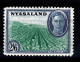 Ref 1640 - Nyasaland 1945 KGVI - 2s/6d Stamp - Growing Tobacco - Mounted Mint SG 154 - Nyasaland (1907-1953)