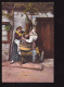 Une Femme Taquine Un Homme à La Pompe à Eau - 3 Postkaarten - Humor
