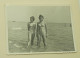 Delcampe - Two Teenage Girls Are Standing In The Shallow Water Of The Sea - Personnes Anonymes