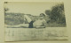 Delcampe - A Naked Guy In Swimming Trunks With Glasses Is Lying On The Wall - Anonieme Personen