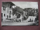 CPA PHOTO SUISSE Canton FRIBOURG GRUYERES Le Centre Vers La Fontaine ANIMEE Enfant Et Son Vélo Tricycle 1950 - Gruyères