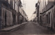 C5-32) NOGARO - GERS - CARTE PHOTO -  RUE NATIONALE - A GAUCHE  LA  BOUCHERIE - A  DROITE  LE  COIFFEUR -  ( 3 SCANS ) - Nogaro