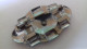 B17 /  BROCHE METAL AVEC BRILLANT EST METAL - Broschen