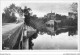 ACAP8-49-0702 - MONTREUIL-BELLAY - Le Chateau Et L'Eglise Sur Les Bords Du Thouet - Prise Du Pont  - Montreuil Bellay