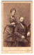 Fotografie J. Julius, Hamburg, Gr. Bleichen 31, Ehepaar In Bürgerlicher Kleidung  - Personnes Anonymes