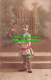 R498615 Small Child With Flowers In Hand. 1919 - World