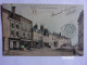 ATTIGNY (Ardennes) UN COTE DE LA PLACE CHARLEMAGNE MAGASINS COLORISEE - Attigny