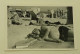 A Man Sleeps On The Beach - Anonieme Personen