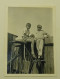 Two Boys On A Wooden Fence - Personnes Anonymes