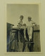 Two Boys On A Wooden Fence - Personnes Anonymes