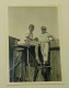 Two Boys On A Wooden Fence - Personnes Anonymes