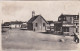 4822158Dorp Huisduinen Met Lunchroom En Kerk. 1933. (FOTO KAART)(kleine Vouwen In De Hoeken, Zie Achterkant) - Den Helder