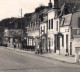 CPSM Vue Rare - INDRE ET LOIRE - ROCHECORBON - LA ROUTE NATIONALE - Commerces, Publicités Et Pompes A Essence BP - Rochecorbon