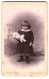 Fotografie J. Mürnseer, Karlsruhe, Rüppurrer-Str. 16, Portrait Kleines Süsses Mädchen Hält Ihre Puppe In Der Hand  - Anonieme Personen