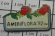 3617 Pin's Pins / Beau Et Rare / MARQUES / FLEURS ROUGES AMERIFLORA'92 TM - Markennamen