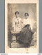 CARTE PHOTO NON IDENTIFIEE REPRESENTANT DEUX JEUNES FEMMES POSANT DANS LE STUDIO PROSPER BATIER A LIMOGES - A Identificar