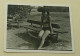 A Hottie In A Bikini Is Sitting On A Bench - Anonyme Personen