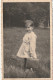 RE 15 - CARTE PHOTO : GARCONNET S' EN ALLANT A L' ECOLE AVEC CARTABLE A TRAVERS LA PRAIRIE (1941) - 2 SCANS - Scènes & Paysages