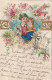 SO 28- CARTE FANTAISIE GAUFREE - COUPLE DANS MEDAILLON AVEC DECOR FLORAL ET AJOUT DE TISSU - DORURE - 2 SCANS - Koppels