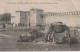 Oudjda Groupe De Chameaux Devant La Porte Des Têtes Animée # 1919     5028 - Casablanca