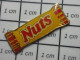 3517  Pin's Pins / Beau Et Rare / ALIMENTATION / BARRE CONFISERIE CHOCOLAT NUTS - Levensmiddelen