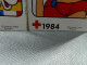 TINTIN+HERGE+CROIX ROUGE: LOT DE 2 AUTOCAOLLANTS  DE 1984 STUDIO HERGE TINTIN +LA CASTAFIORE - Stickers