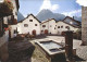 11896880 Scuol Tarasp Vulpera Dorfplatz Mit Brunnen In Scuol Scuol - Other & Unclassified