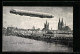 AK Köln, Reichsluftschiff Zeppelin, Die Stadt überfliegend  - Airships