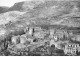 06 GOURDON AK#DC109 VUE AERIENNE GENERALE DE LA VILLE ET SES MASSIFS MONTAGNEUX - Gourdon